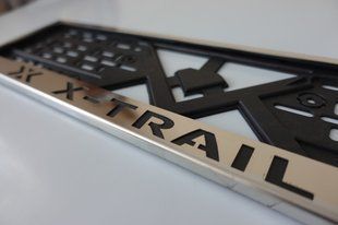 Рамка номерного знака из нержавеющей стали с надписью X-TRAIL (1 шт). Рамка номера из нержавейки ИКС ТРЕЙЛ X-TRAIL фото